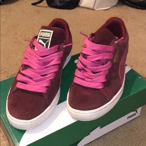 Burgundy pumas